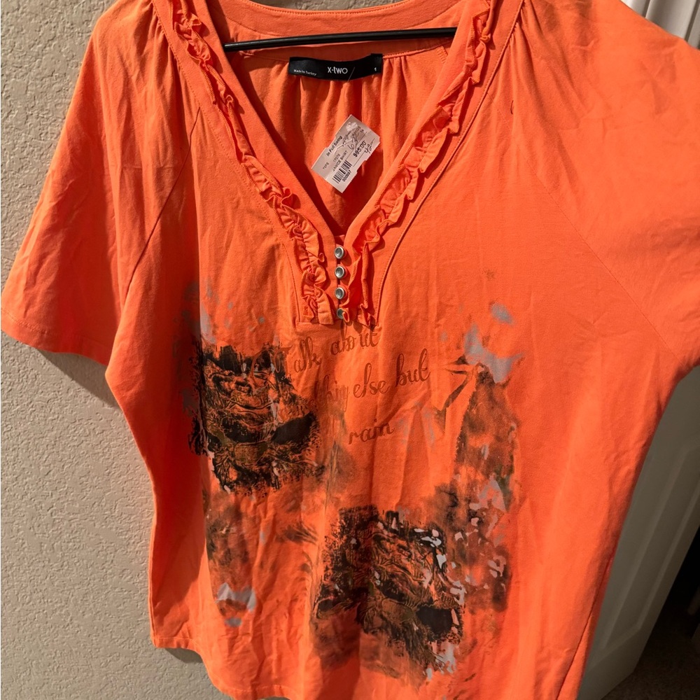 Vibrant Orange Short Sleeve Top with Artistic Design